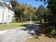 Long driveway leading to a charming two-story home at 207 E 2Nd Ave, Pierson, FL 32180