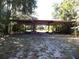 Open-air covered structure, providing ample storage space at 207 E 2Nd Ave, Pierson, FL 32180