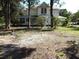 Two story home with mature landscaping and large yard at 207 E 2Nd Ave, Pierson, FL 32180