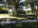 Two story home with large front yard and mature trees at 207 E 2Nd Ave, Pierson, FL 32180