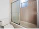 Bathroom with tub shower combination and tile flooring at 5994 Seminole Woods Dr, Port Orange, FL 32127