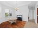 Formal dining room featuring hardwood floors and chandelier at 5994 Seminole Woods Dr, Port Orange, FL 32127