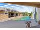 Relaxing pool with screened enclosure and open yard view at 5994 Seminole Woods Dr, Port Orange, FL 32127