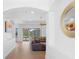 Elegant entryway with views into a spacious living room at 5994 Seminole Woods Dr, Port Orange, FL 32127