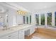 Elegant bathroom with double vanity, large soaking tub, and abundant natural light at 5994 Seminole Woods Dr, Port Orange, FL 32127