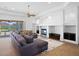 Comfortable living room with sectional sofa and fireplace at 5994 Seminole Woods Dr, Port Orange, FL 32127