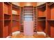 Large walk-in closet with ample shelving and hanging space at 5994 Seminole Woods Dr, Port Orange, FL 32127