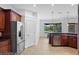Kitchen with stainless steel appliances and pantry at 5994 Seminole Woods Dr, Port Orange, FL 32127