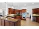 Large kitchen with granite countertops and stainless steel appliances at 5994 Seminole Woods Dr, Port Orange, FL 32127
