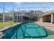 Long, refreshing pool with a screened enclosure at 5994 Seminole Woods Dr, Port Orange, FL 32127