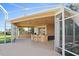 Covered patio with pool bar and access to the pool area at 5994 Seminole Woods Dr, Port Orange, FL 32127