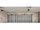 Two-car garage with automatic garage door openers at 5994 Seminole Woods Dr, Port Orange, FL 32127