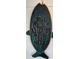 Charming fish-shaped wall art with the words Fish Stories Told Here at 1628 Paradise Ln, Astor, FL 32102