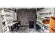 Garage with shelving for extra storage at 1628 Paradise Ln, Astor, FL 32102