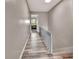 Bright hallway with light gray walls and wood-look flooring at 2329 River Ridge Rd # 160, Deland, FL 32720