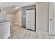 White refrigerator and gray cabinets in kitchen at 2329 River Ridge Rd # 160, Deland, FL 32720