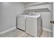 Laundry room with washer, dryer, and shelving at 2329 River Ridge Rd # 160, Deland, FL 32720