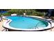 Refreshing kidney-shaped pool with ample deck space at 2329 River Ridge Rd # 160, Deland, FL 32720