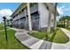 Exterior of a building with a walkway and landscaping at 2329 River Ridge Rd # 160, Deland, FL 32720
