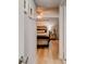 Well-lit bedroom with wood-look flooring and direct access to the bathroom at 2801 N Halifax Ave # 143, Daytona Beach, FL 32118