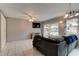 Living room with tiled floors and sliding doors at 2801 N Halifax Ave # 143, Daytona Beach, FL 32118