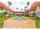 Community shuffleboard court with surrounding landscaping at 2801 N Halifax Ave # 143, Daytona Beach, FL 32118