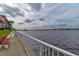Relaxing waterfront path with a bench and scenic river views at 2801 N Halifax Ave # 143, Daytona Beach, FL 32118