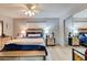 Spacious bedroom with a comfortable bed, light wood furniture, and a mirrored closet at 2801 N Halifax Ave # 143, Daytona Beach, FL 32118