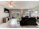 Living room with tiled floors and sliding doors at 2801 N Halifax Ave # 143, Daytona Beach, FL 32118