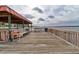 Wooden dock with seating and scenic water views at 2801 N Halifax Ave # 143, Daytona Beach, FL 32118