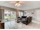 Living room with tiled floors and sliding doors at 2801 N Halifax Ave # 143, Daytona Beach, FL 32118