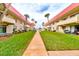 Well-maintained community with a central courtyard and lush green space at 2801 N Halifax Ave # 143, Daytona Beach, FL 32118