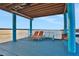 Relaxing deck with lounge chairs overlooking the water at 138 Old Carriage Rd, Ponce Inlet, FL 32127
