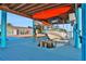 Covered boat lift for a small boat, kayaks on deck at 138 Old Carriage Rd, Ponce Inlet, FL 32127