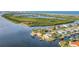 Waterfront home with private dock and lush landscaping at 138 Old Carriage Rd, Ponce Inlet, FL 32127