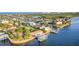 Beautiful waterfront property with lush landscaping and private boat dock at 138 Old Carriage Rd, Ponce Inlet, FL 32127