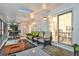 Sunroom with view into dining room and water views at 138 Old Carriage Rd, Ponce Inlet, FL 32127
