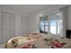 Bedroom with water view and sliding glass doors at 138 Old Carriage Rd, Ponce Inlet, FL 32127
