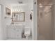 Clean bathroom, white vanity, toilet and shower stall at 138 Old Carriage Rd, Ponce Inlet, FL 32127