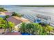 Waterfront home with boat lift and lush landscaping at 138 Old Carriage Rd, Ponce Inlet, FL 32127