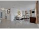 Spacious living room with tiled floors and access to other rooms at 138 Old Carriage Rd, Ponce Inlet, FL 32127