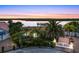 Luxury waterfront home with gated entry and sunset view at 138 Old Carriage Rd, Ponce Inlet, FL 32127