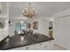 Spacious kitchen with granite countertops and white cabinets at 138 Old Carriage Rd, Ponce Inlet, FL 32127