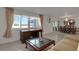 Living room with large windows and water views at 138 Old Carriage Rd, Ponce Inlet, FL 32127