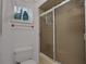 Simple bathroom with shower/tub and white toilet at 138 Old Carriage Rd, Ponce Inlet, FL 32127