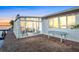 Relaxing sunroom with patio access, brick pavers, and water views at 138 Old Carriage Rd, Ponce Inlet, FL 32127