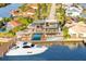 Modern waterfront home with pool and private boat dock at 138 Old Carriage Rd, Ponce Inlet, FL 32127