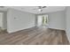 Living room with hardwood floors and neutral wall colors at 217 N Hill Ave # 20, Deland, FL 32724