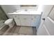 Bathroom with white vanity and grey flooring at 217 N Hill Ave # 20, Deland, FL 32724