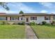Cozy ranch-style home with red shutters and stone accents at 217 N Hill Ave # 20, Deland, FL 32724